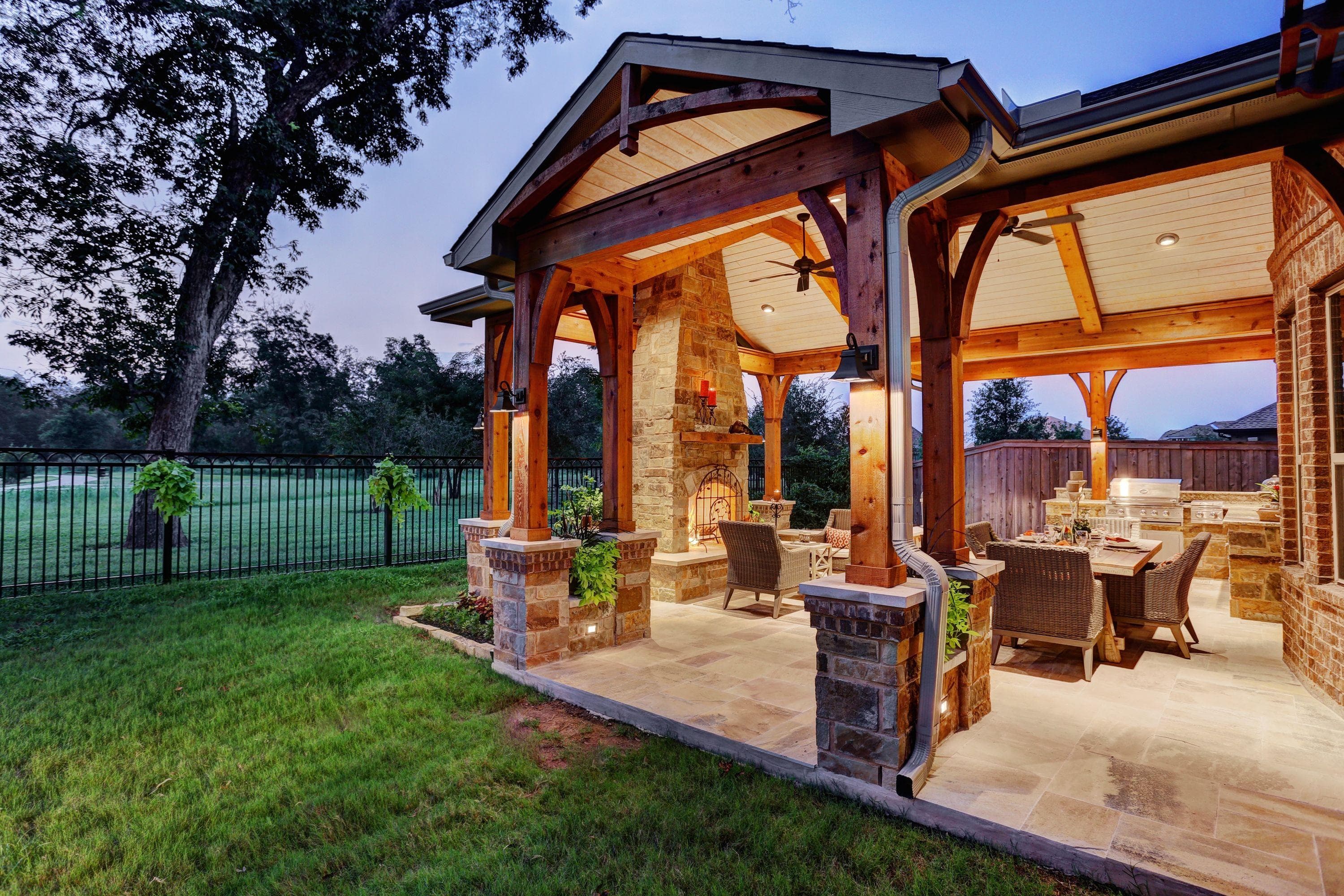 Cedar patio cover with stone columns in Behrens Ranch, Round Rock