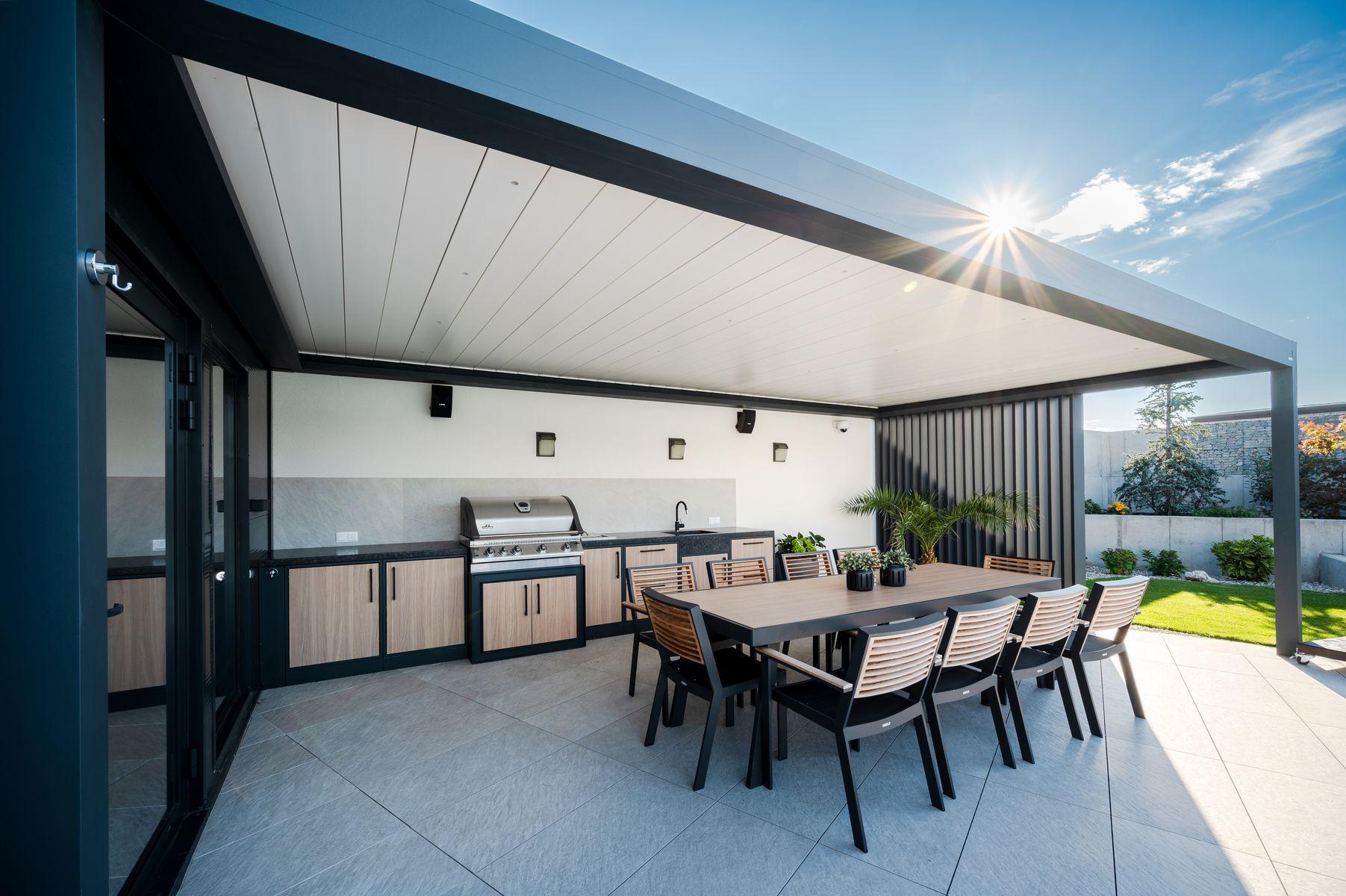 Insulated aluminum patio cover with outdoor kitchen on a new home in Travisso, Leander