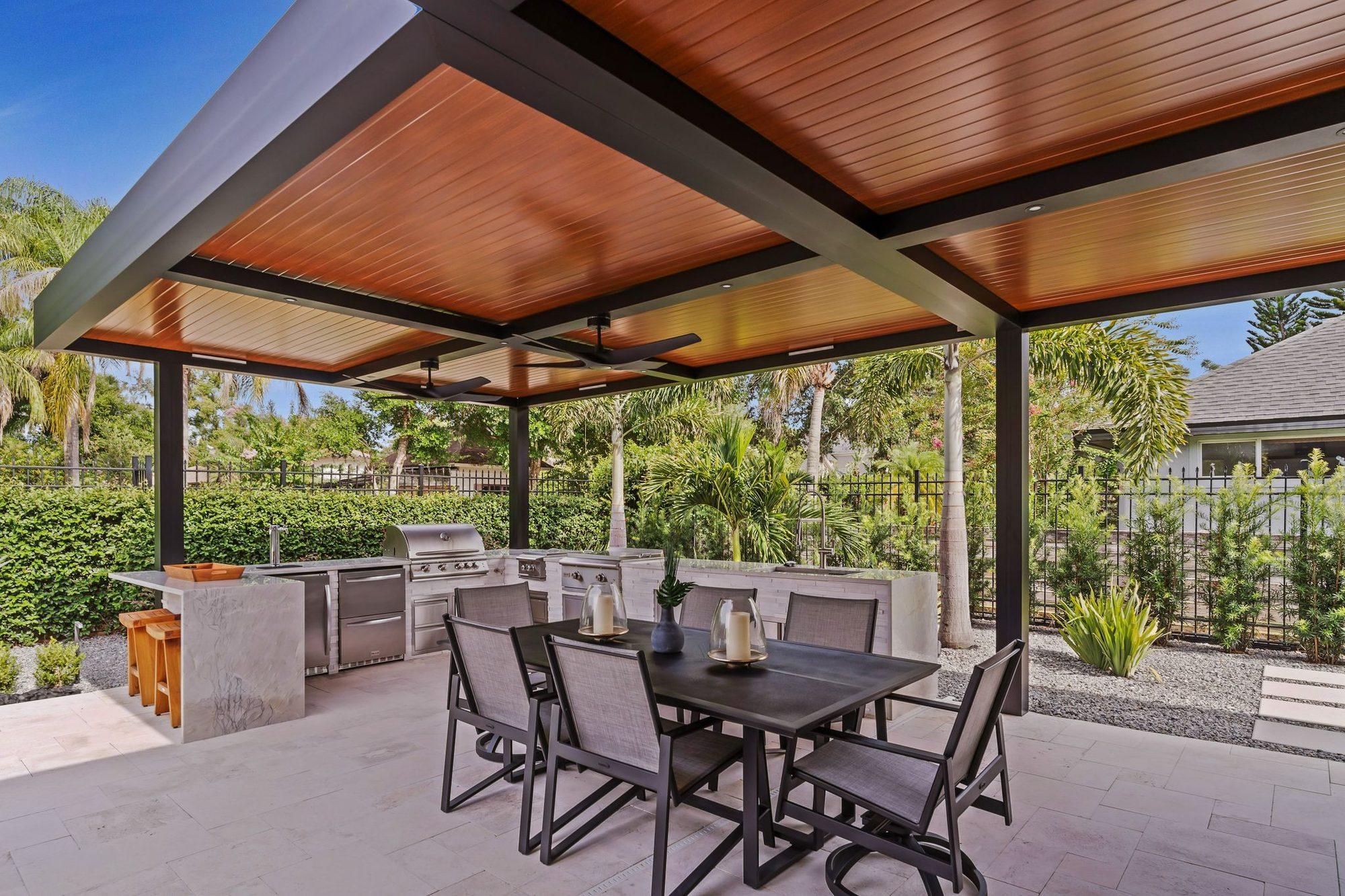 Insulated aluminum patio cover over an outdoor kitchen in the Ranch at Brushy Creek, Cedar Park