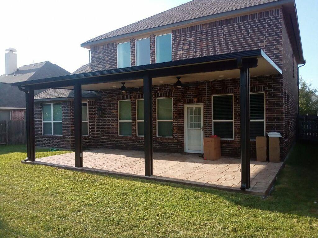 New aluminum patio cover with fans on a two-story home in Blackhawk, Pflugerville